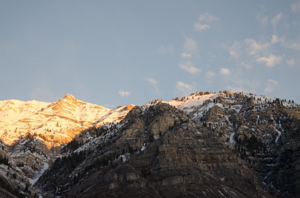 Free Image of Majestic Snow Covered Mountain Against Sky Background 