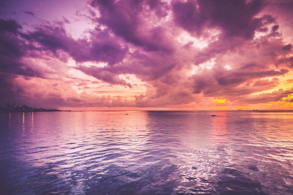 Free Image of Majestic Sunset Over the Ocean With Clouds 