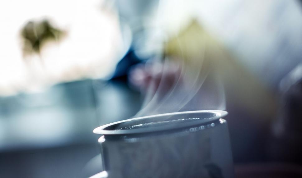 Free Image of A Cup of Coffee on a Table 
