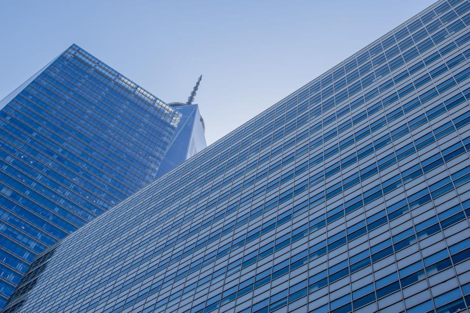 Free Image of Two Tall Buildings Standing Side by Side 