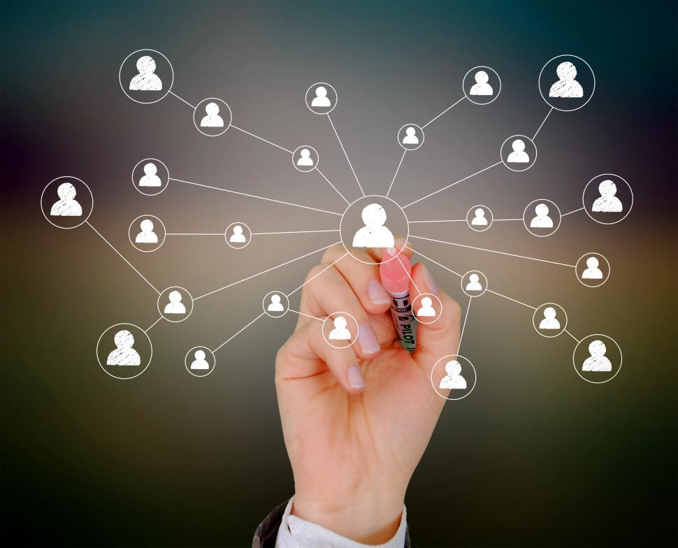 Free Image of Businessman drawing a social network on virtual screen 