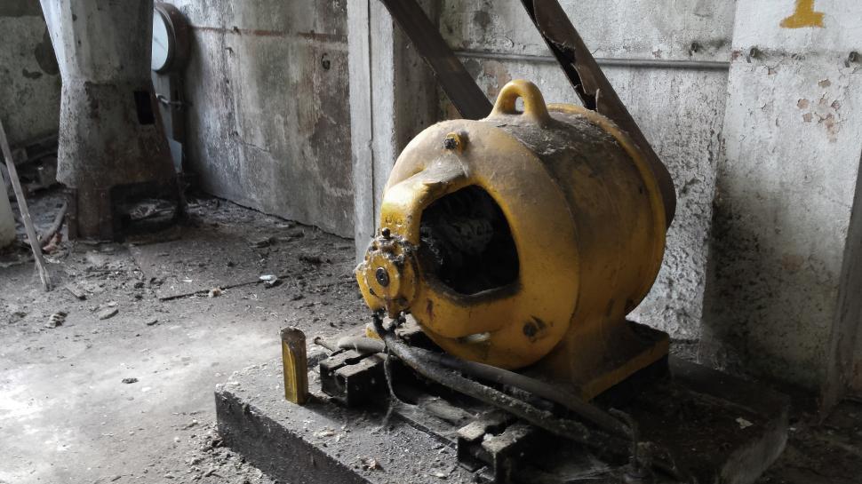 Free Image of Large Yellow Object Inside Building 