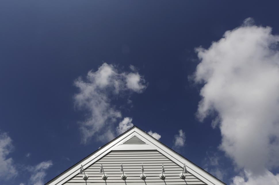 Free Image of Top of Building With Sky Background 