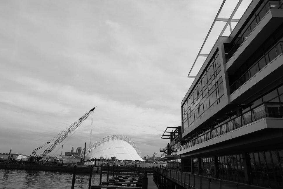 Free Image of Crane Operating Near Building 