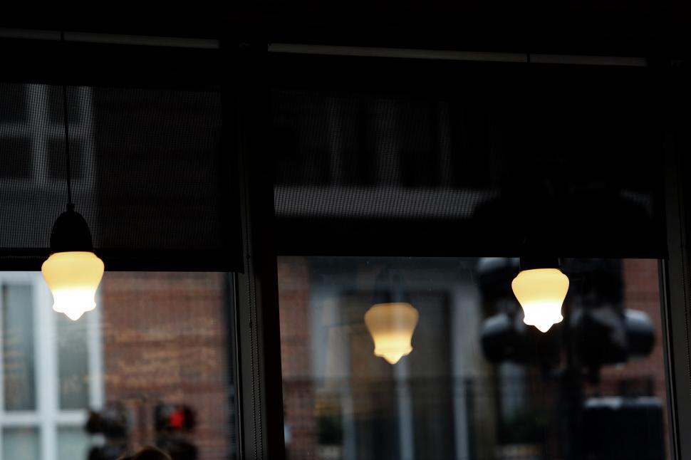 Free Image of Hanging Lights by Window 