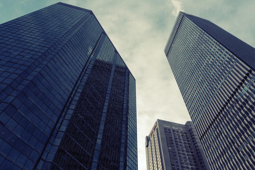 Free Image of Two Tall Buildings Standing Side by Side 