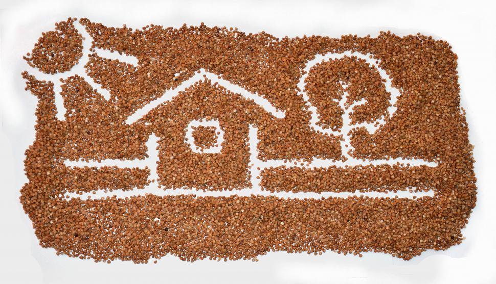 Free Image of House scene drawing on buckwheat.  