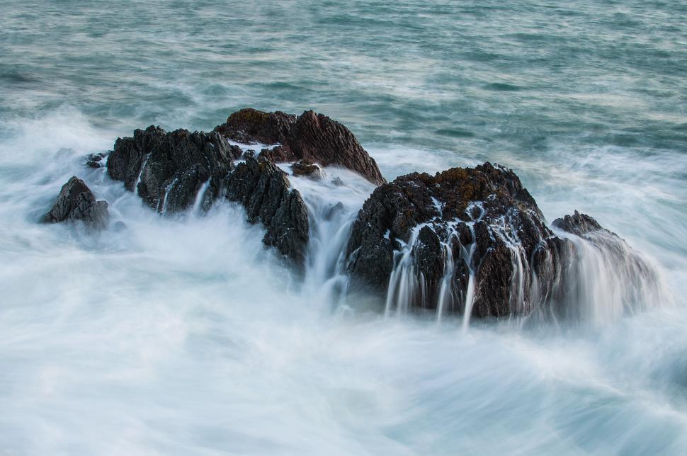 Free Image of Rocky Surroundings of a Vast Water Body 