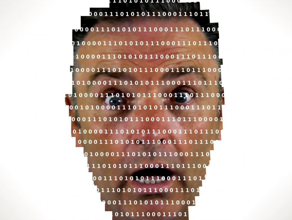 Free Image of Surprised man looking into binary code - The online privacy prob 