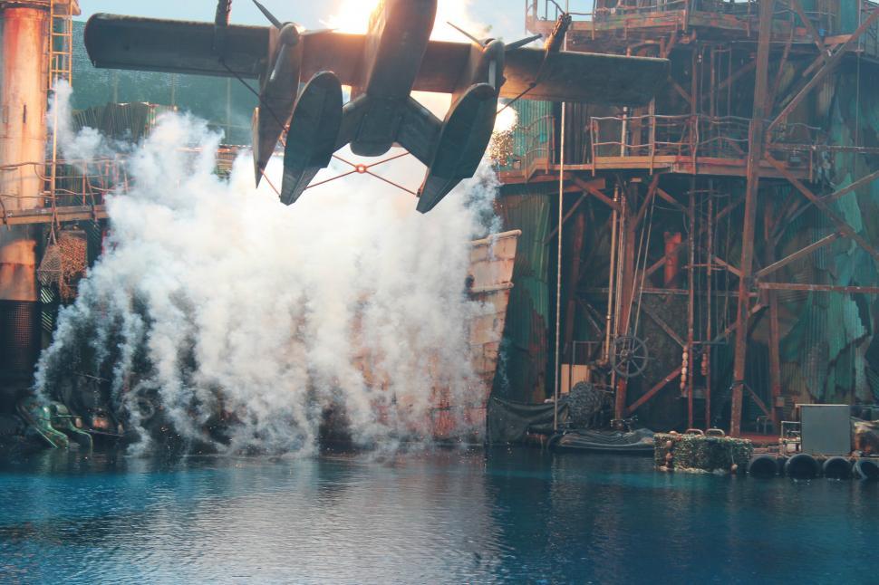 Free Image of Plane Flying Over Large Body of Water 