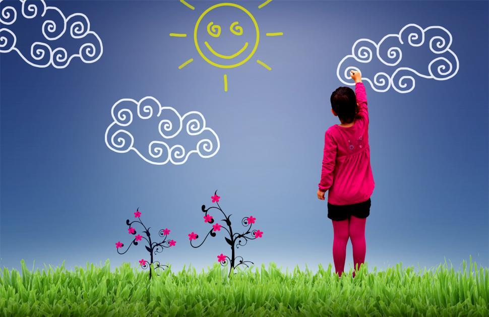 Free Image of Little girl painting the sky - Child joy and happiness concept 