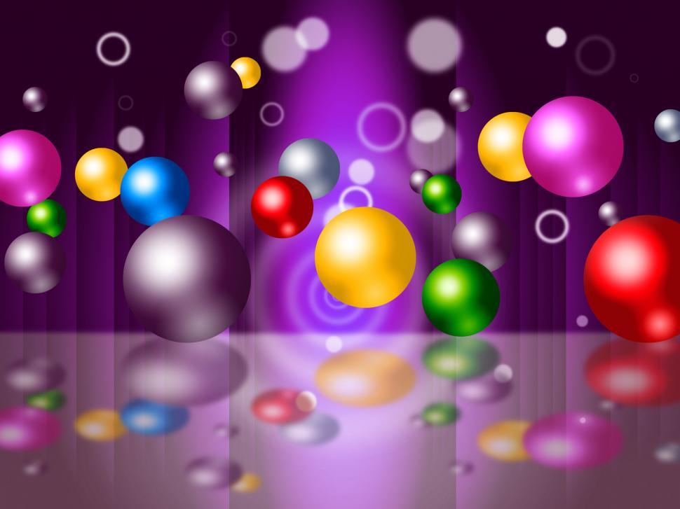 Free Image of Sphere Bouncing Represents Colourful Spheres And Vibrant 