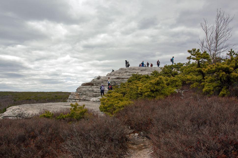 Free Image of Hikers Climbing Rocks at Sam s Point Preserve 