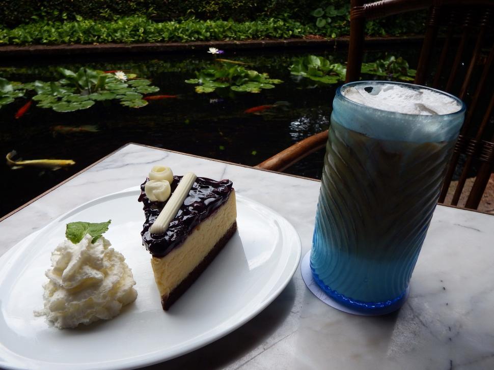 Free Image of Coffee Cream and Cake Outside  