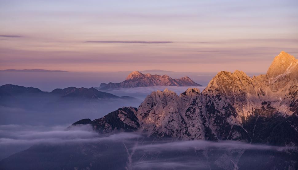 Free Image of A View of a Mountain Range From a Plane Window 