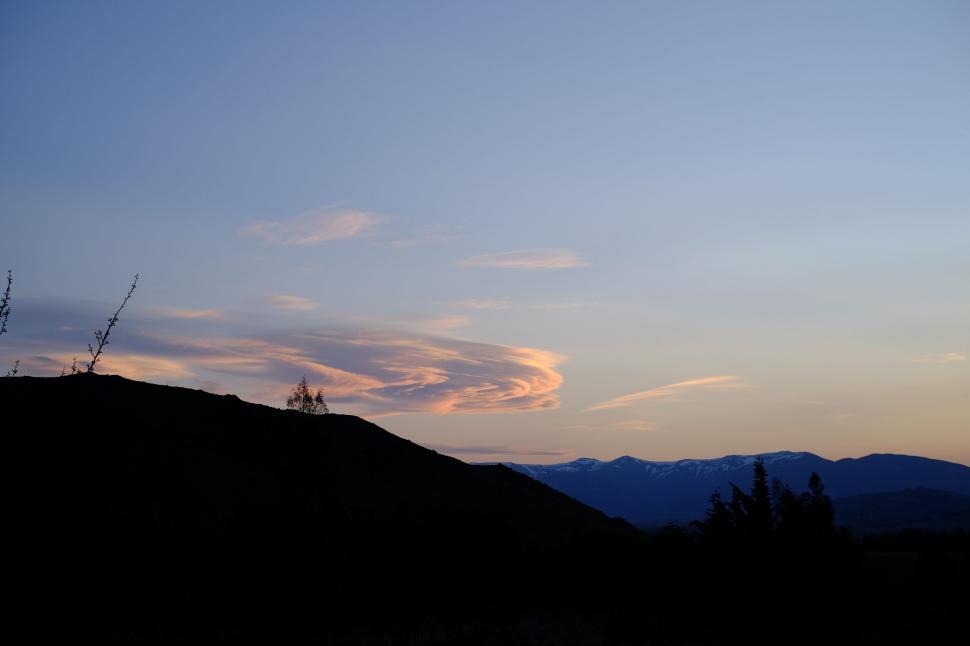 Free Image of Silhouette of Tree on Hill at Sunset 