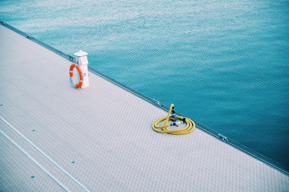 Free Image of Life Preserver on Dock by Water 