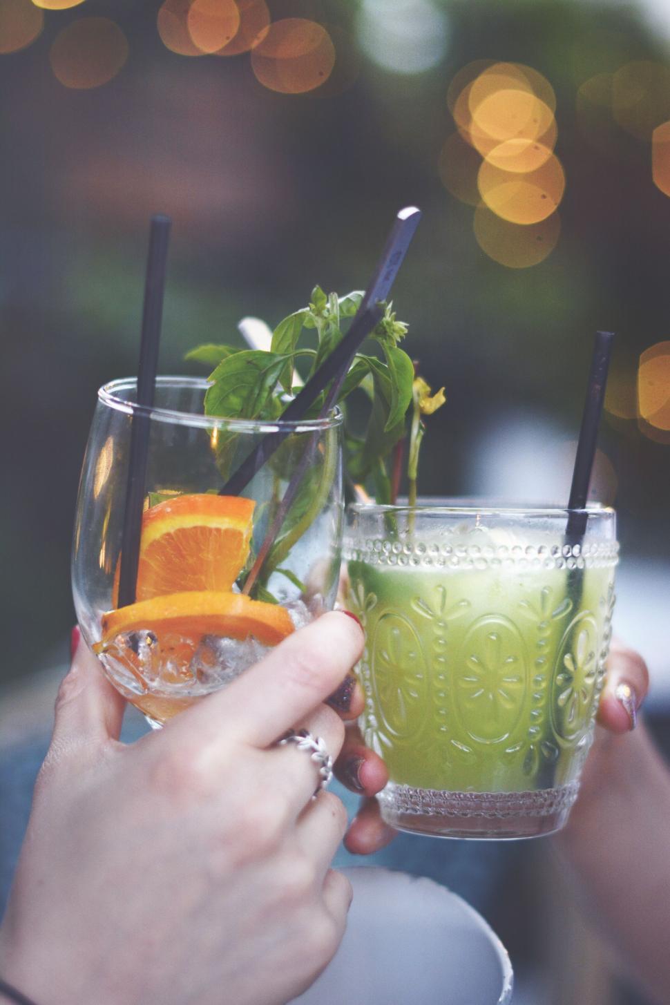 Free Image of Person Holding a Glass With a Drink 