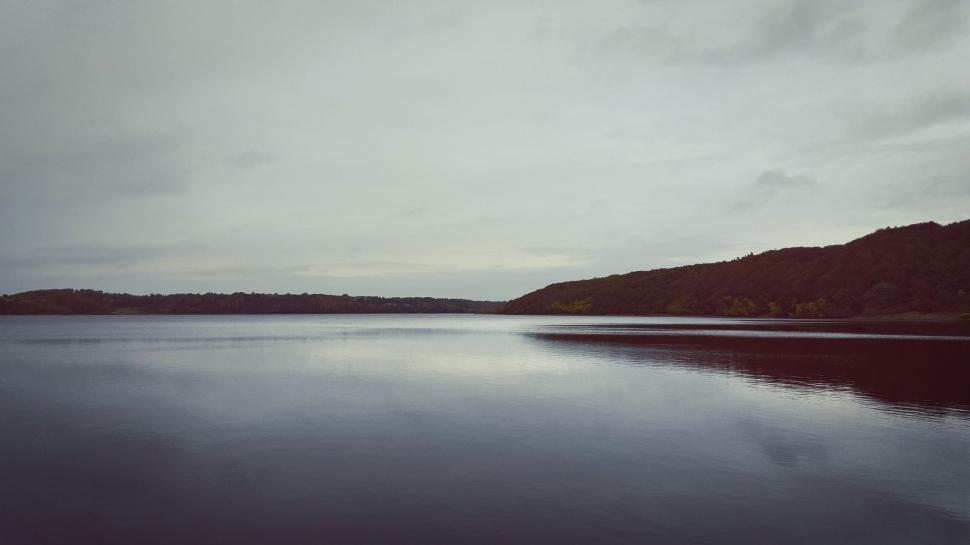 Free Image of Majestic Water Body Surrounded by Towering Mountains 