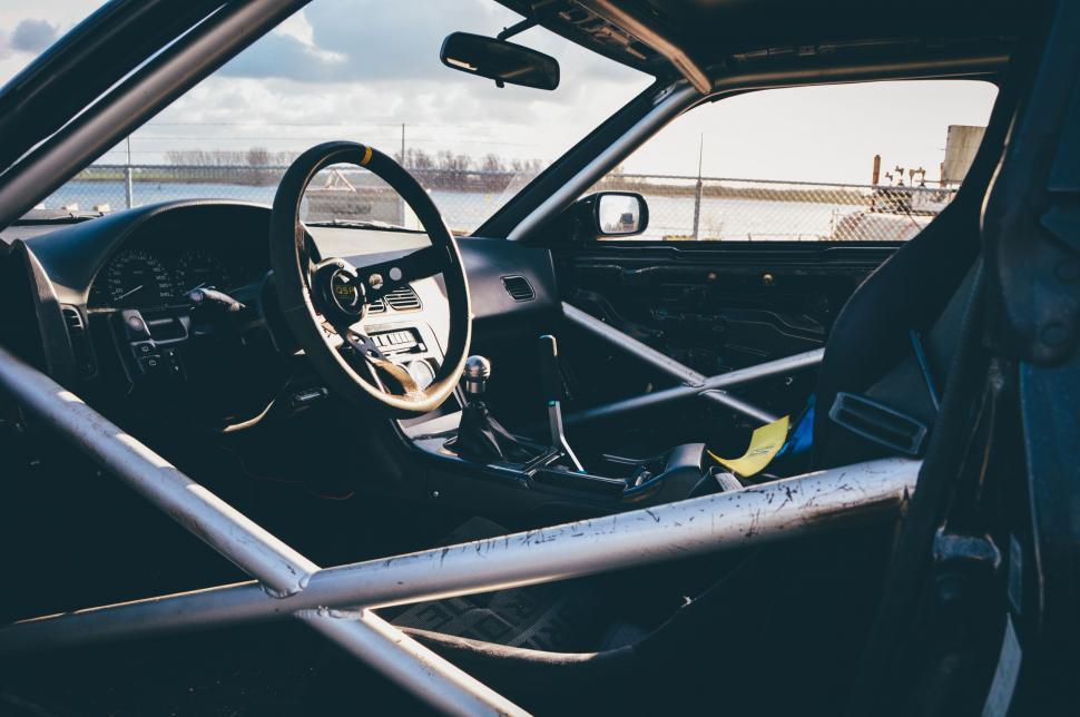 Free Image of Interior of a Car With Steering Wheel and Dashboard 