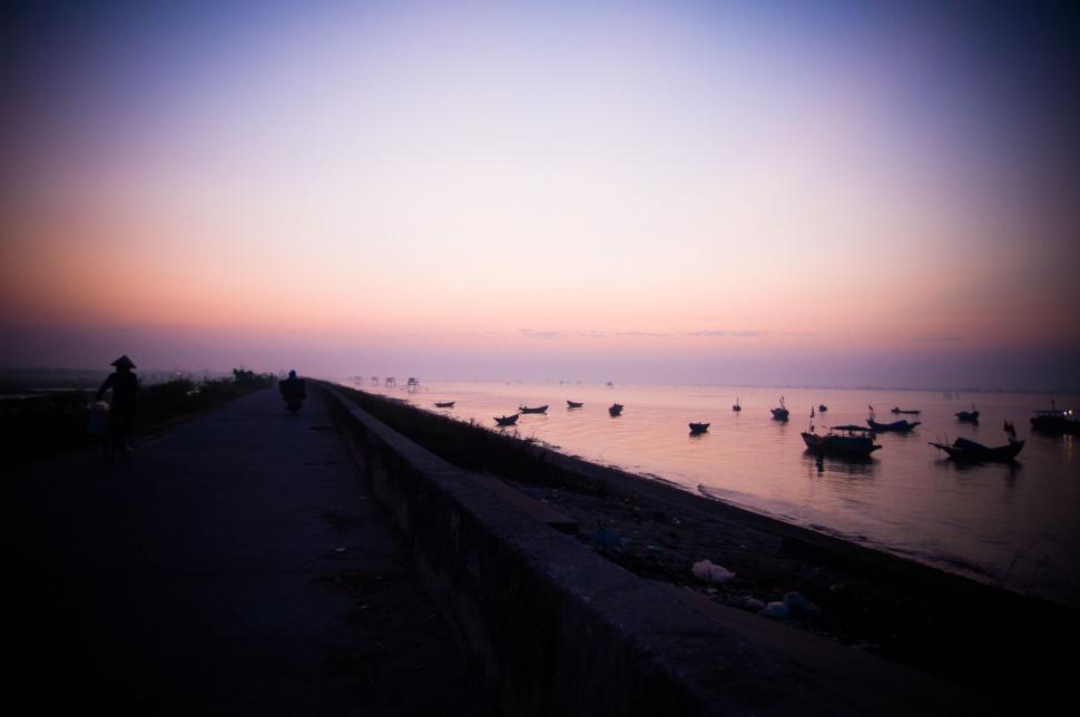 Free Image of Group of Boats Floating on Top of a Body of Water 