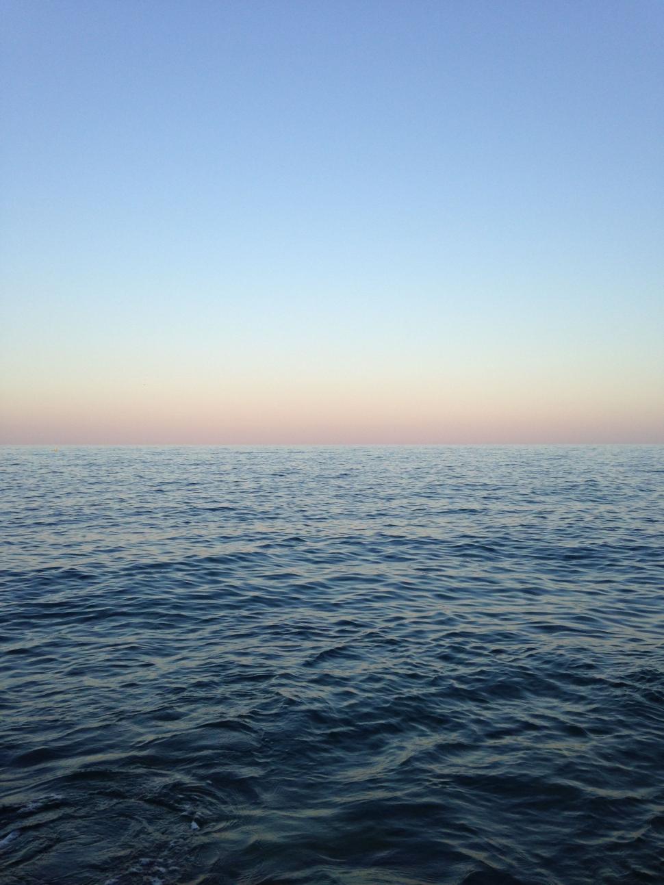 Free Image of Vast Water Body With Sky Background 