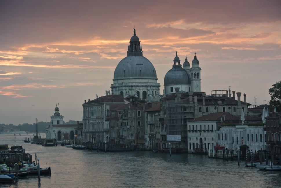 Free Image of Waterfront City Landscape With Urban Buildings and Large Body of Water 