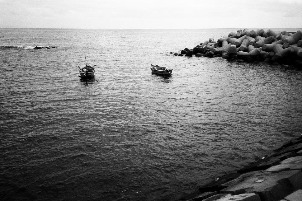 Free Image of Boats Floating on Body of Water 