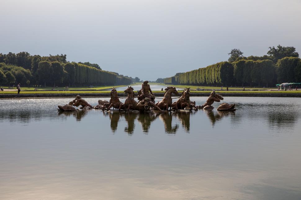 Free Image of Group of Rocks in Middle of Lake 