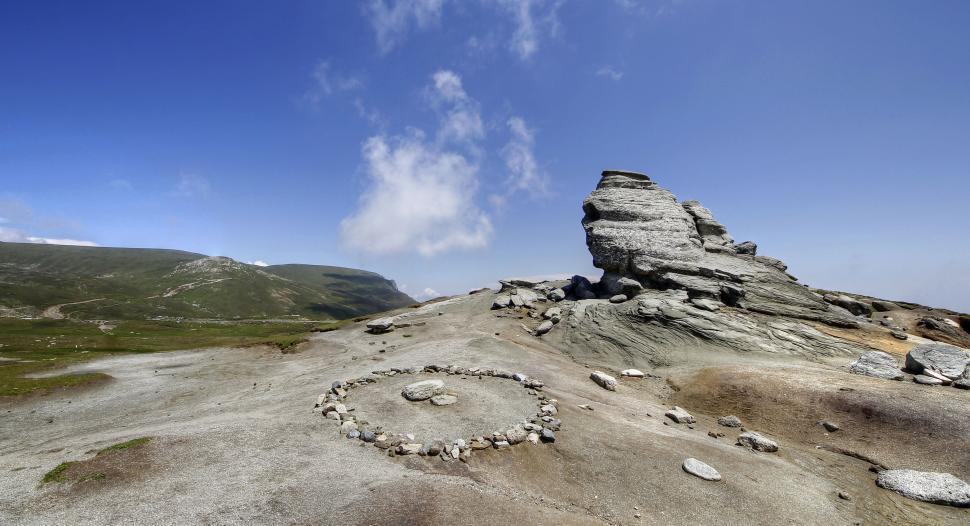Free Image of Rock Formation Amid Desert Landscape 