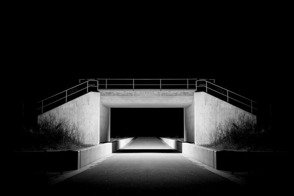 Free Image of Black and White Photo of an Abandoned Tunnel 