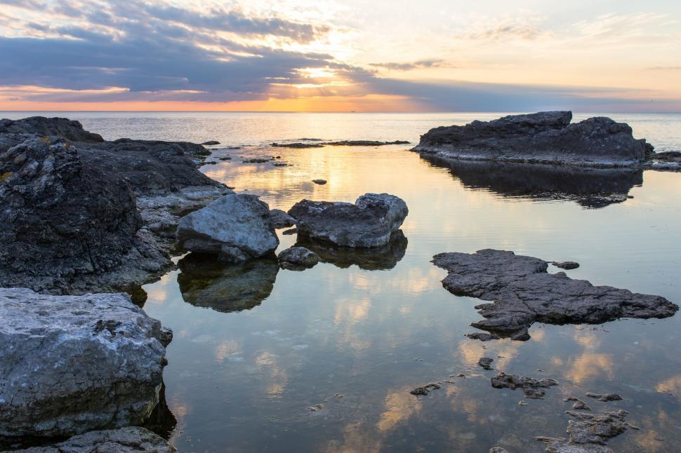 Free Image of Body of Water With Rocks 