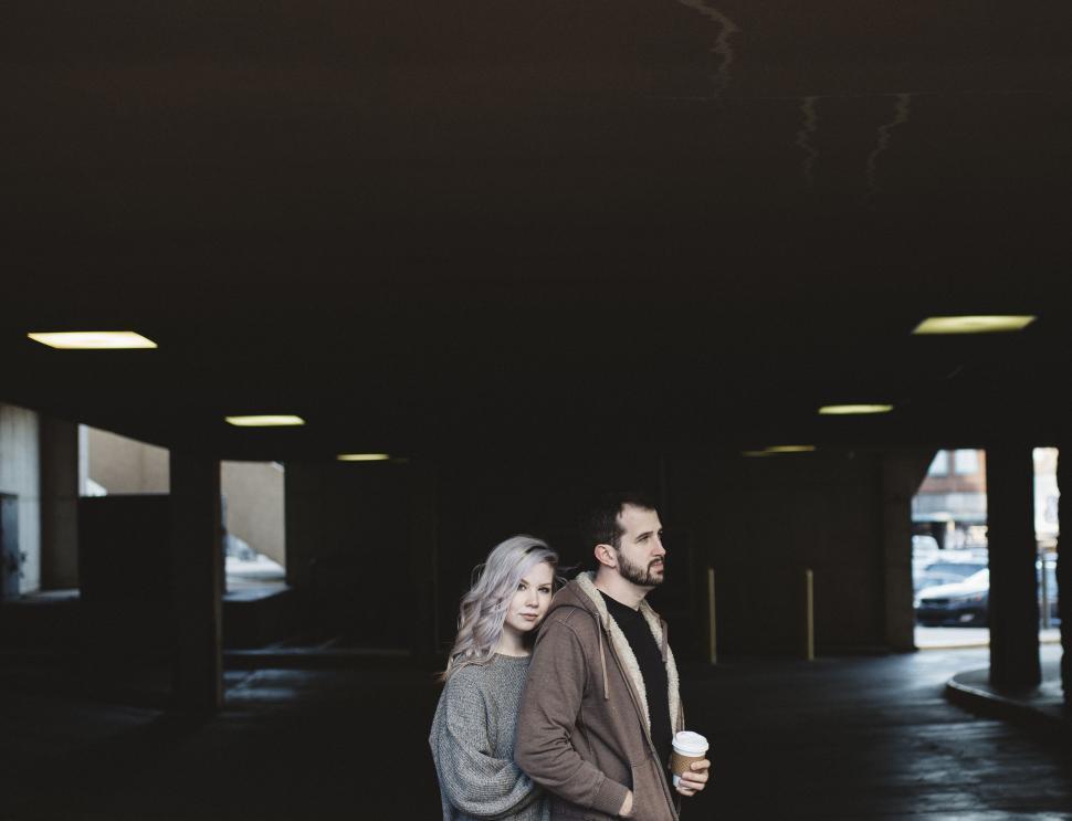 Free Image of A Man and a Woman Standing Together 