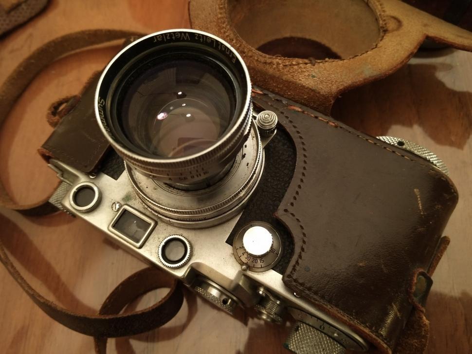 Free Image of Camera on Wooden Table 
