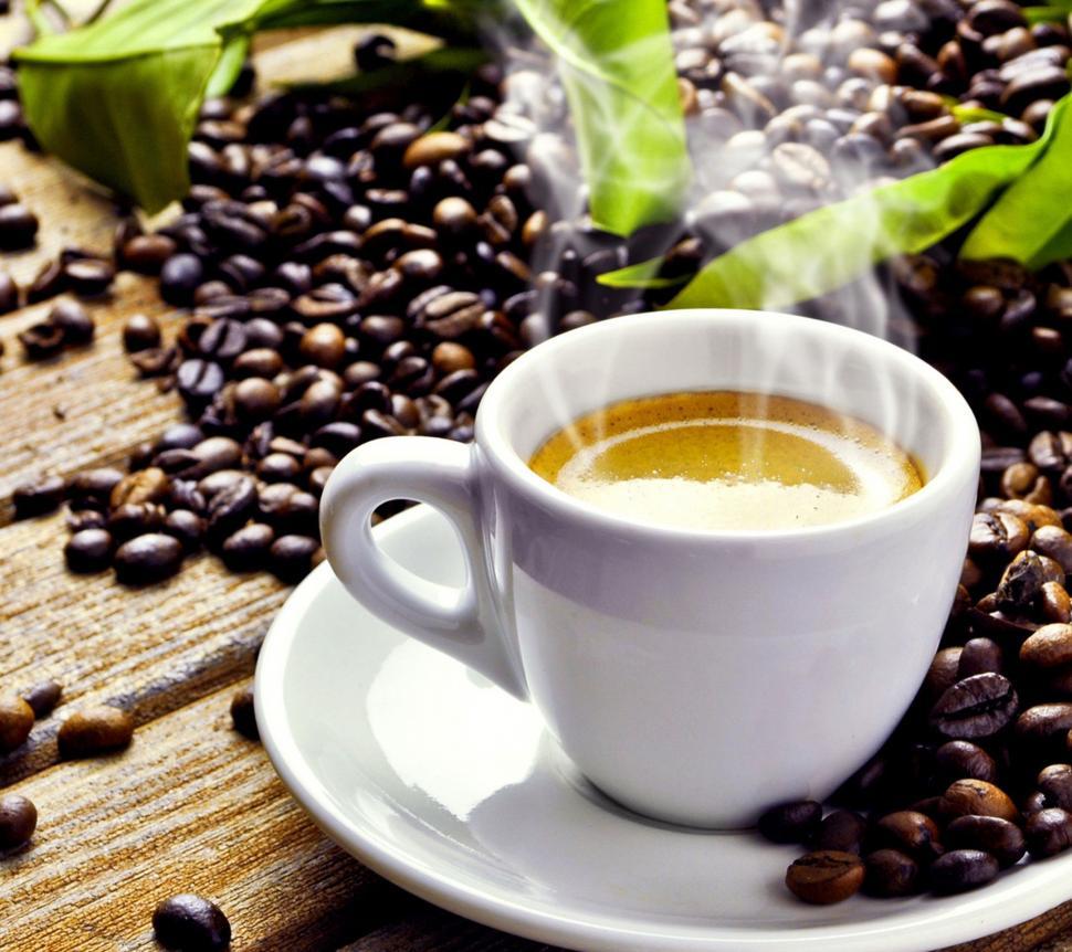 Free Image of A Cup of Coffee on a White Saucer 