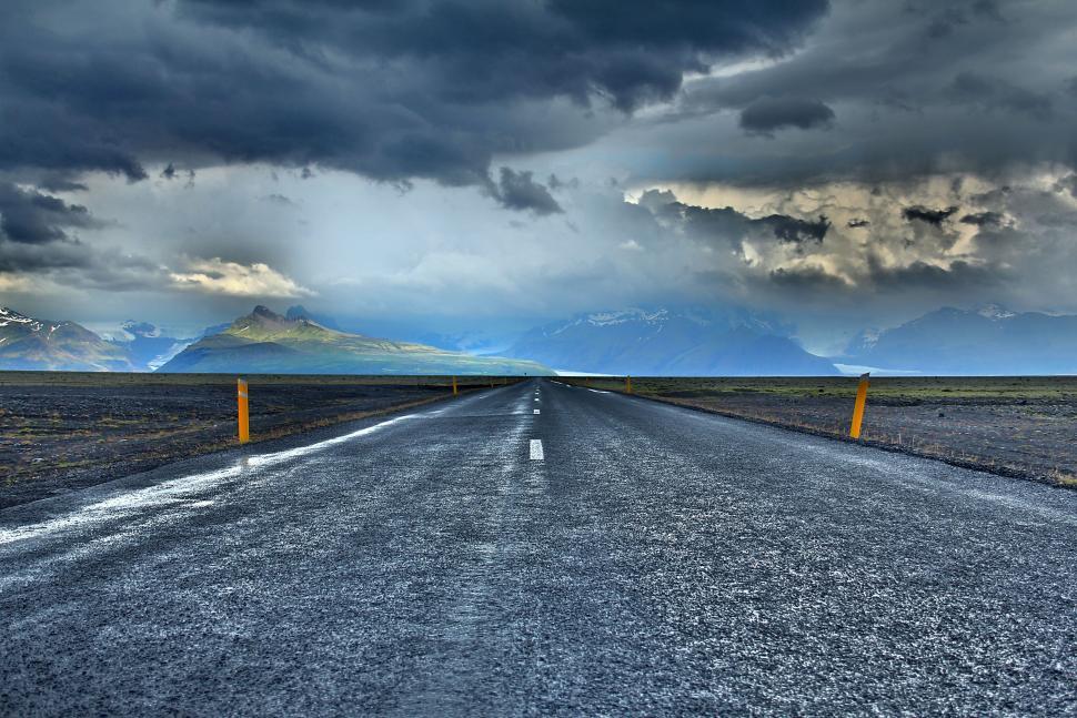 Free Image of Empty Road Stretching Through Desolate Landscape 
