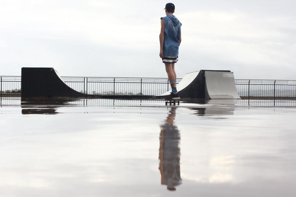 Free Image of Man Standing on Skateboard Ramp 