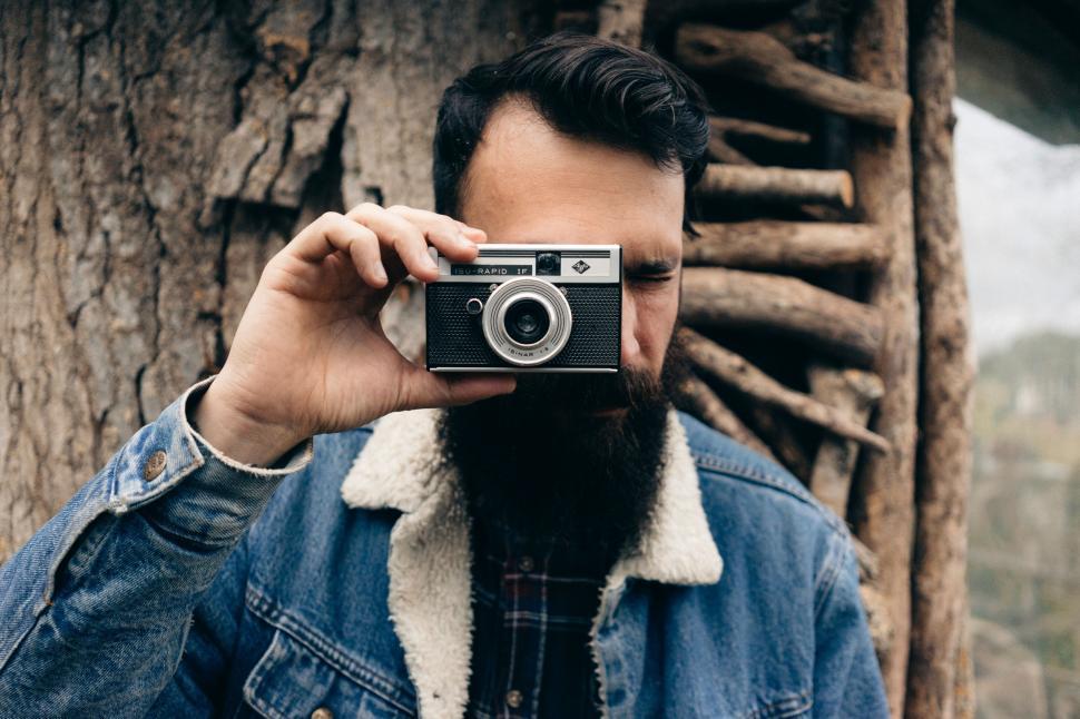 Free Image of Man Taking Selfie With Camera 
