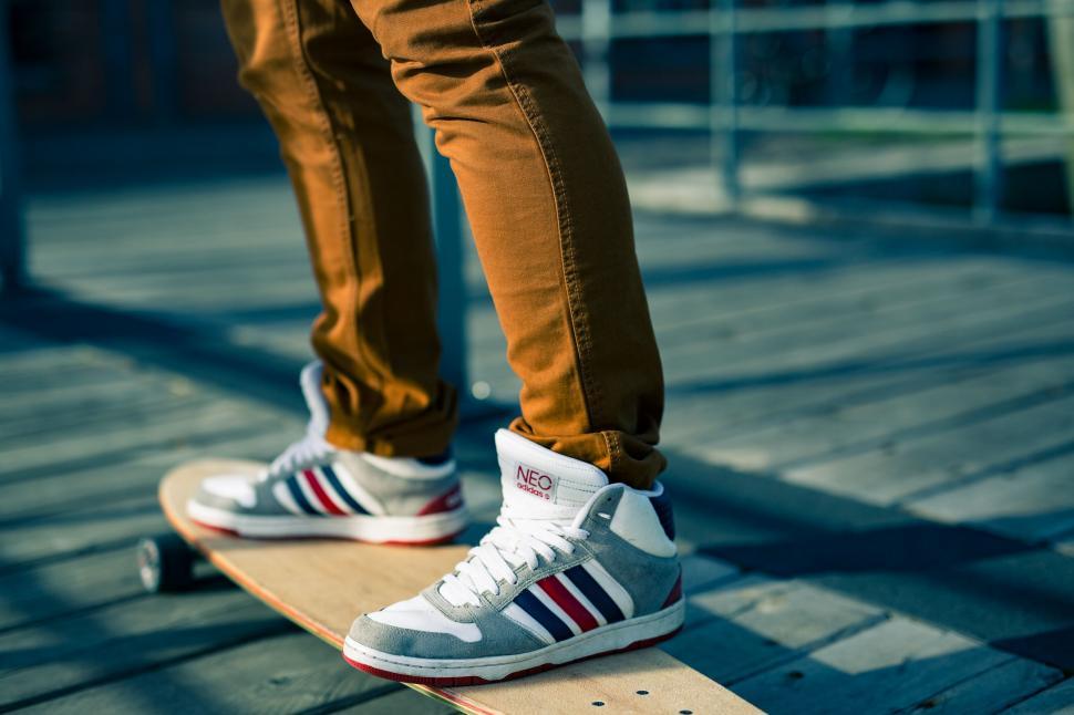 Free Image of Person Skateboarding on Sidewalk 