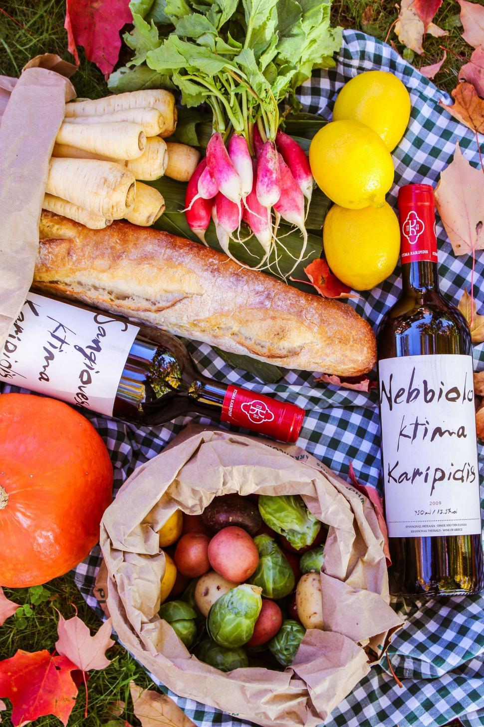 Free Image of Table Setting With Wine Bottle and Vegetable Basket 