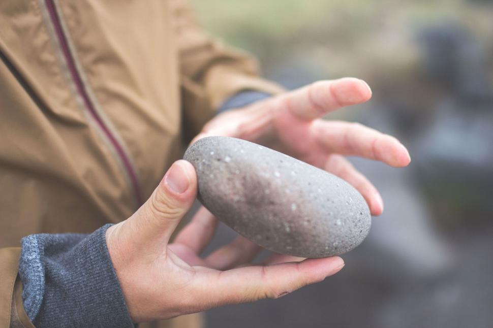 Free Image of Person Holding a Rock 