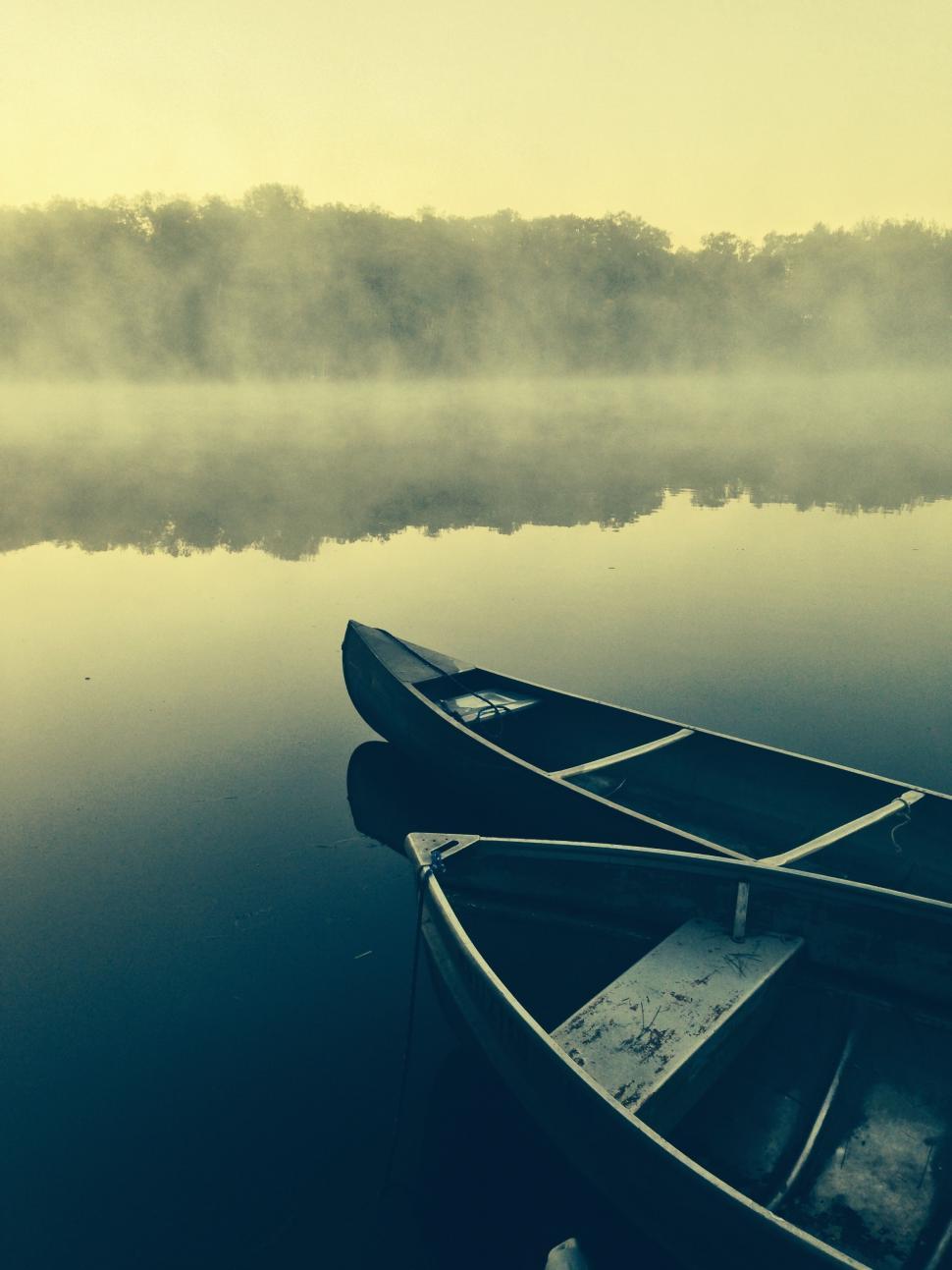 Free Image of Two Boats Floating on a Lake 