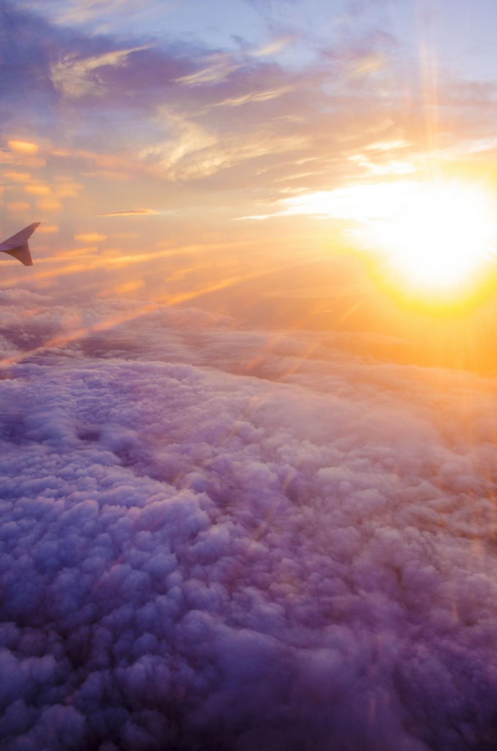 Free Image of A View of the Wing of an Airplane in the Sky 