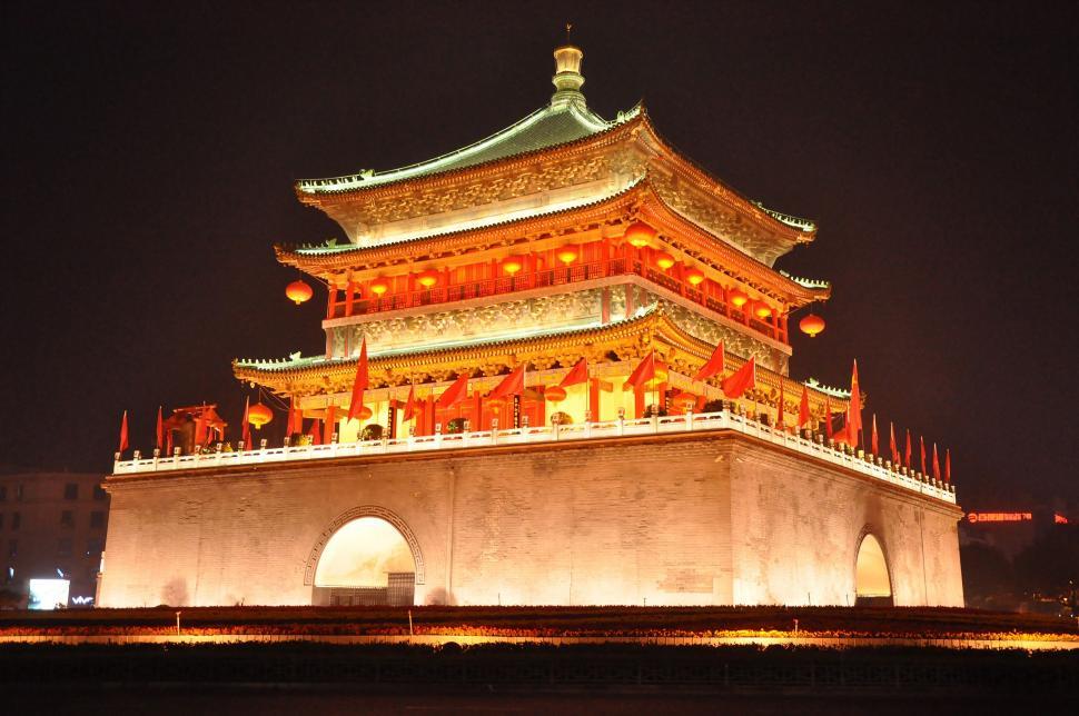Free Image of Tower Illuminated With Lights in the Night 