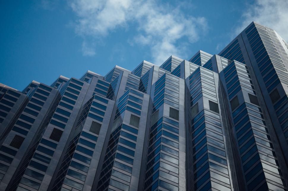 Free Image of Towering Skyscraper With Numerous Windows 