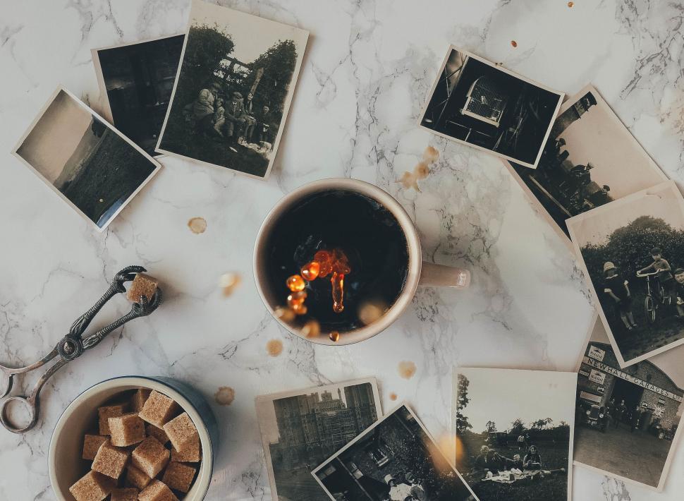 Free Image of Table With Pictures and Bowl of Food 