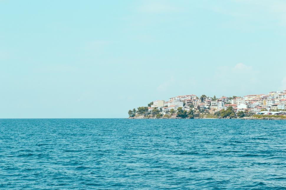 Free Image of Small Island Amid Vast Water 