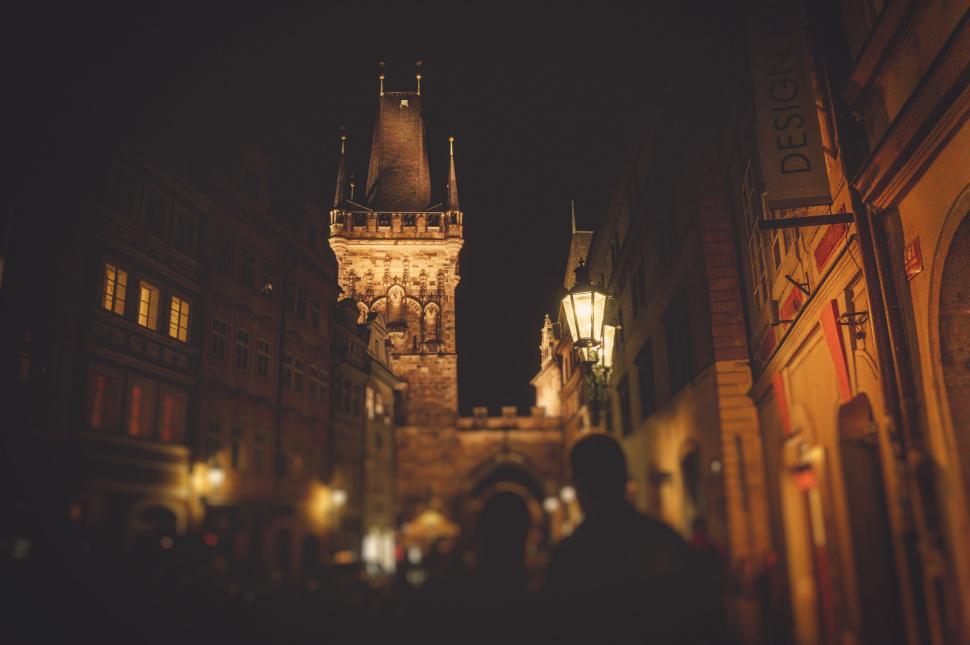 Free Image of Majestic Clock Tower Overseeing Urban Cityscape at Night 