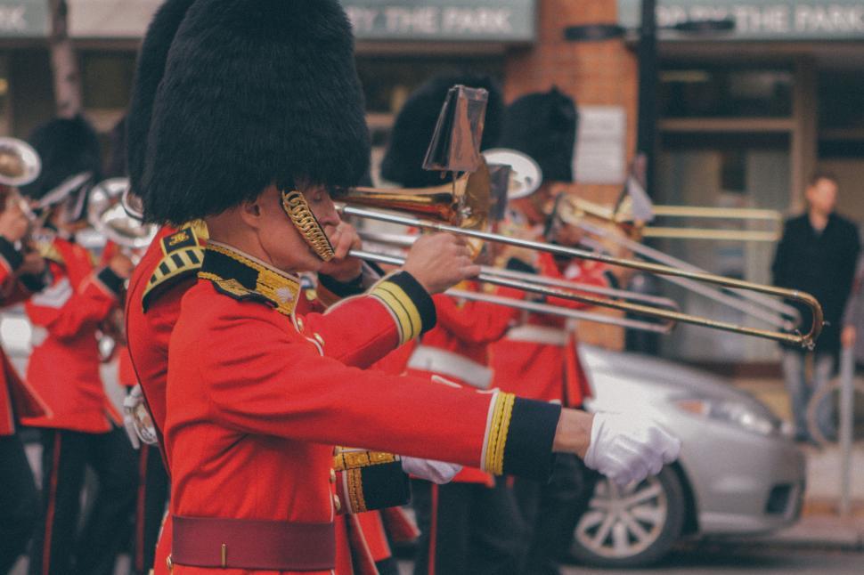 Free Image of Group of Men in Uniform Playing Musical Instruments 