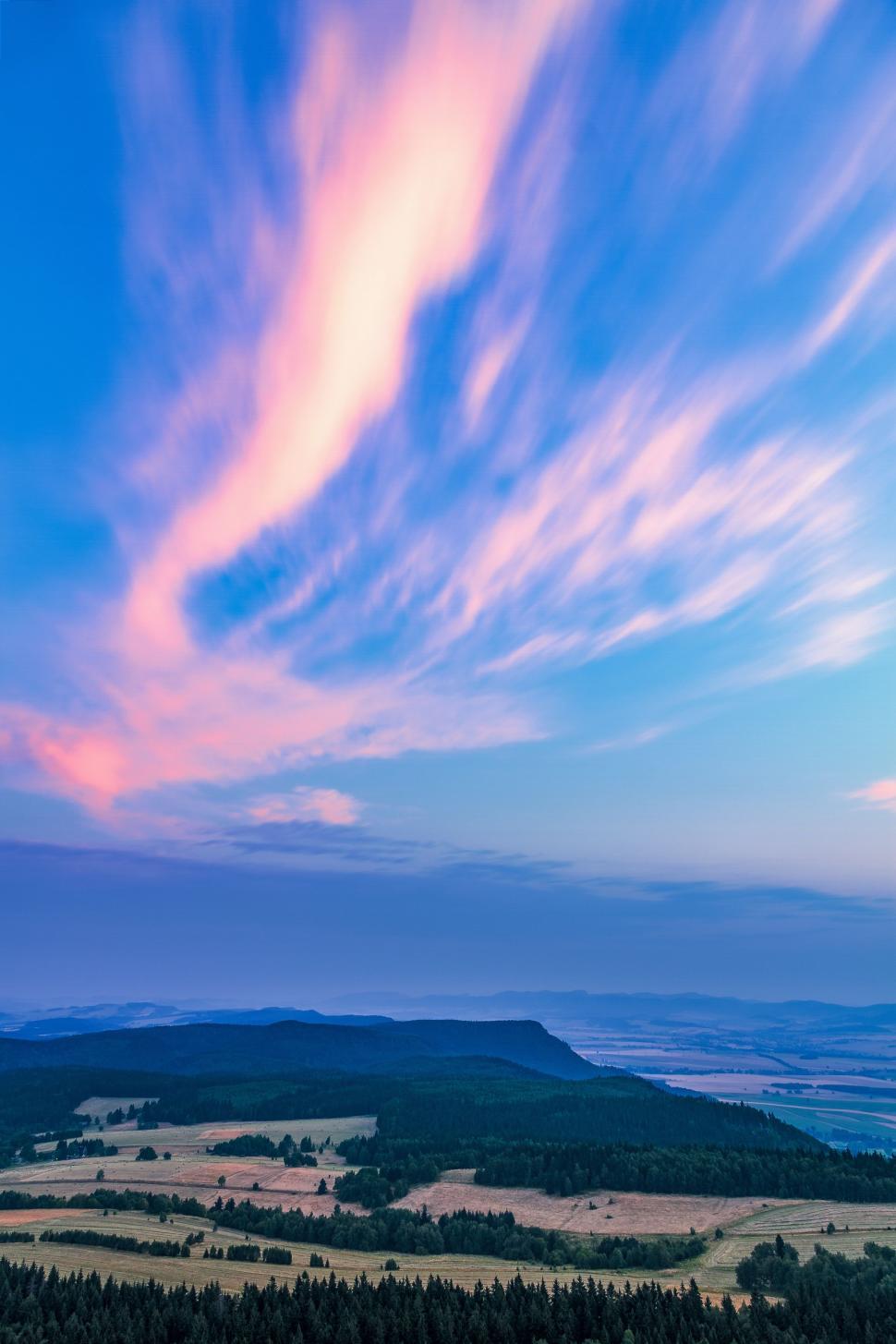 Free Image of Blue Sky With Clouds Over a Field 